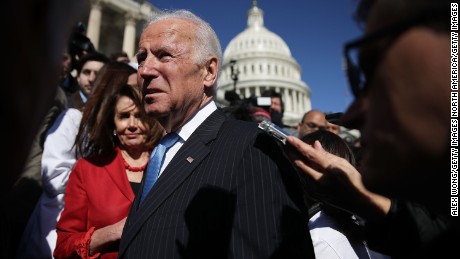 WASHINGTON, DC - MARCH 22:  Former U.S. Vice President Joseph Biden speaks to members of the media as House Minority Leader Rep. Nancy Pelosi (D-CA) looks on after an event on health care at the House East Front of the Capitol March 22, 2017 in Washington, DC. House Democrats held the event to mark the seventh anniversary of the Affordable Care Act. (Photo by Alex Wong/Getty Images)