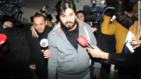 Reza Zarrab arriving at a police station in Istanbul on December 17, 2013.