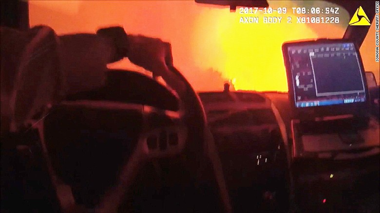 Bodycam video shows dramatic wildfire rescue