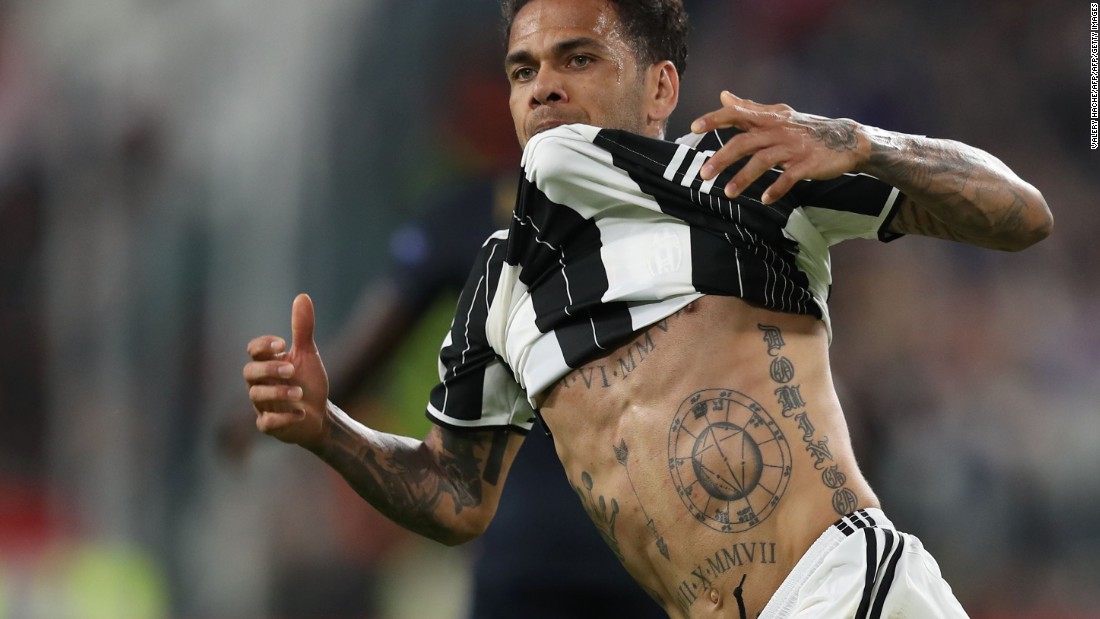 PSG defender Dani Alves is one of football's characters. The former Barca star's arms are adorned with Catholic images and dedications to his family, while across his chest is his son's name in giant script. 