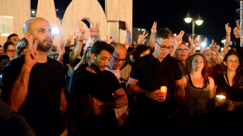 Thousands of people gather for a candlelight vigil in Sliema in tribute to Caruana Galizia on Monday.