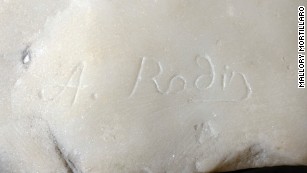 Rodin&#39;s signature is chiseled at the base.