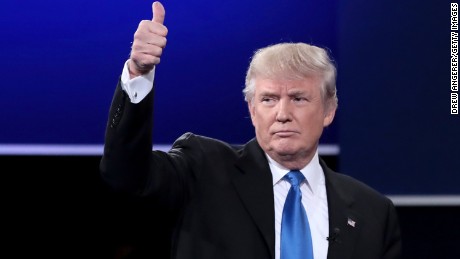 HEMPSTEAD, NY - SEPTEMBER 26:  Republican presidential nominee Donald Trump waves after the Presidential Debate with Democratic presidential nominee Hillary Clinton at Hofstra University on September 26, 2016 in Hempstead, New York.  The first of four debates for the 2016 Election, three Presidential and one Vice Presidential, is moderated by NBC&#39;s Lester Holt.  (Photo by Drew Angerer/Getty Images)