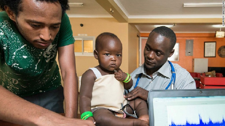 Brian Turyabagye testing the biomedical smart jacket.