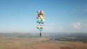 Man uses party balloons to float 15 miles