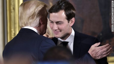 US President Donald Trump (L) congratulates his son-in-law and senior advisor Jared Kushner after the swearing-in of senior staff in the East Room of the White House on January 22, 2017 in Washington, DC. / AFP / MANDEL NGAN        (Photo credit should read MANDEL NGAN/AFP/Getty Images)