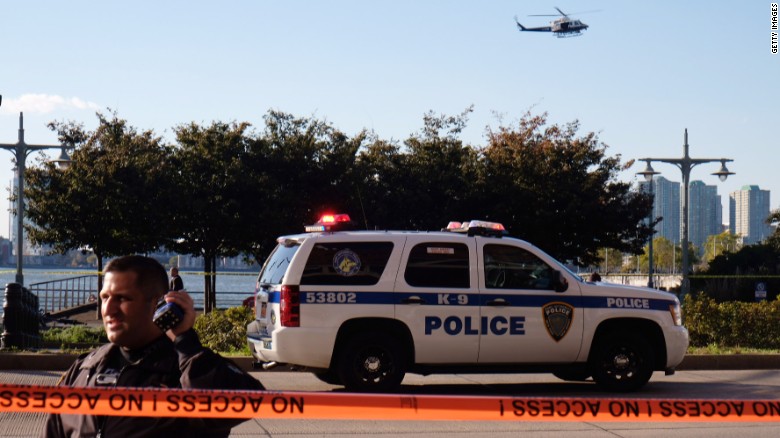 Police gather at the scene after the attack in New York&#39;s lower Manhattan.