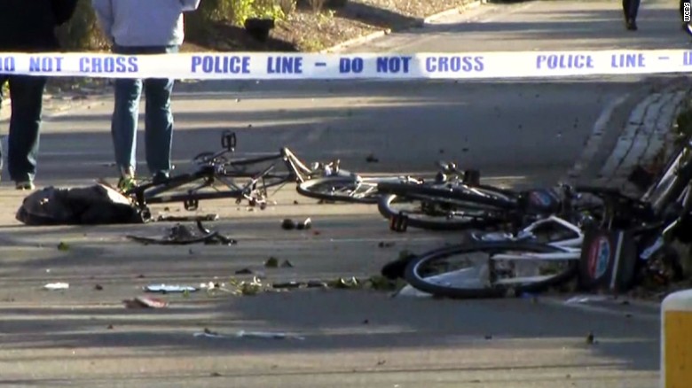 Parts of mangled bikes are strewn on the ground in Manhattan on Tuesday.