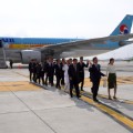 south korea olympic flame arrives plane incheon airport 