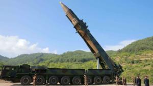 This picture taken and released on July 4, 2017 by North Korea&#39;s official Korean Central News Agency (KCNA) shows North Korean leader Kim Jong-Un (2nd R) inspecting the test-fire of the intercontinental ballistic missile Hwasong-14 at an undisclosed location. North Korea declared on July 4 it had successfully tested its first intercontinental ballistic missile -- a watershed moment in its push to develop a nuclear weapon capable of hitting the mainland United States. / AFP PHOTO / KCNA VIA KNS / STR / South Korea OUT / REPUBLIC OF KOREA OUT ---EDITORS NOTE--- RESTRICTED TO EDITORIAL USE - MANDATORY CREDIT &quot;AFP PHOTO/KCNA VIA KNS&quot; - NO MARKETING NO ADVERTISING CAMPAIGNS - DISTRIBUTED AS A SERVICE TO CLIENTS THIS PICTURE WAS MADE AVAILABLE BY A THIRD PARTY. AFP CAN NOT INDEPENDENTLY VERIFY THE AUTHENTICITY, LOCATION, DATE AND CONTENT OF THIS IMAGE. THIS PHOTO IS DISTRIBUTED EXACTLY AS RECEIVED BY AFP. / (Photo credit should read STR/AFP/Getty Images)