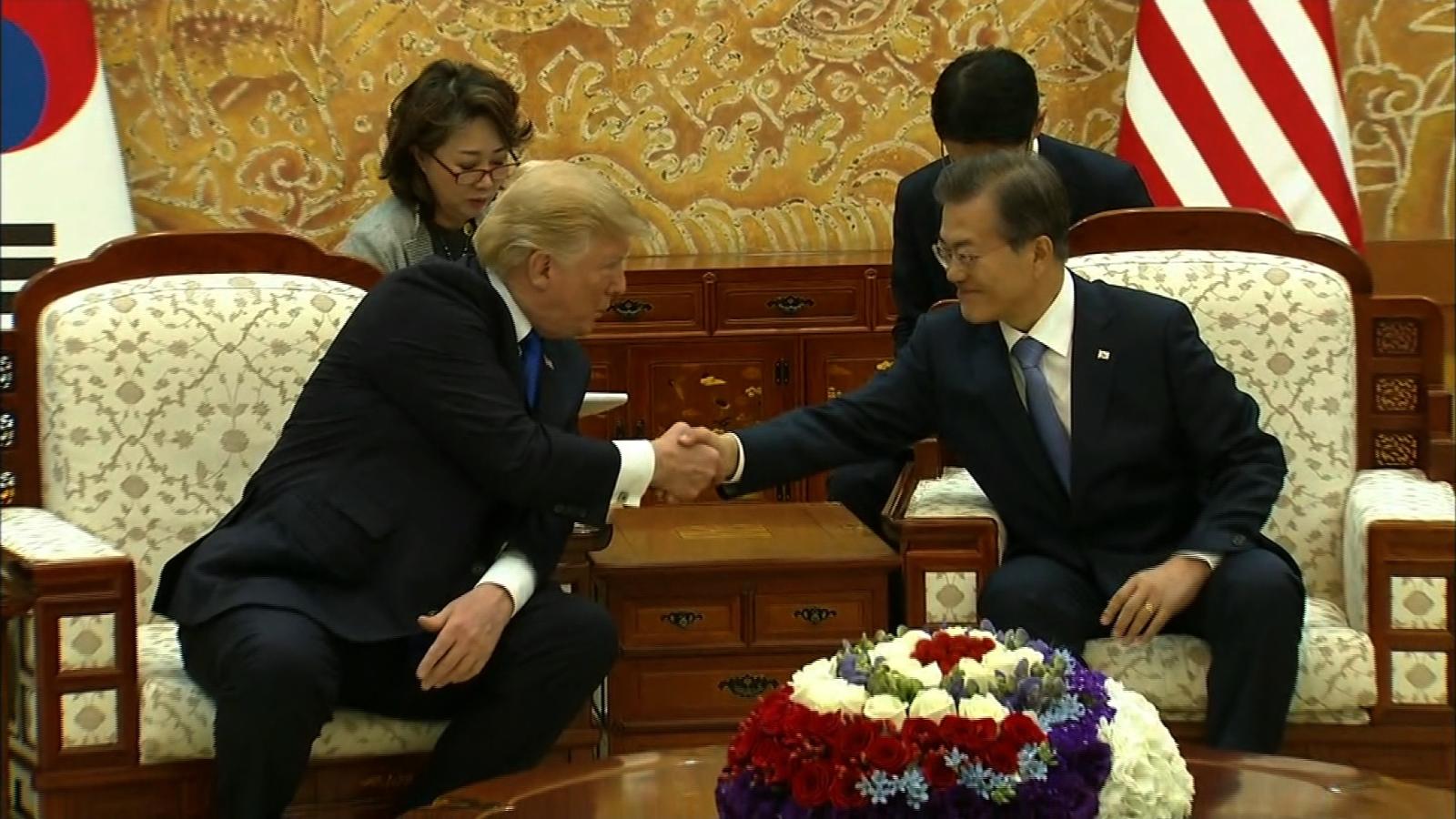 Trump Feeds Fish Then Winds Up Pouring Entire Box Of Food Into Koi