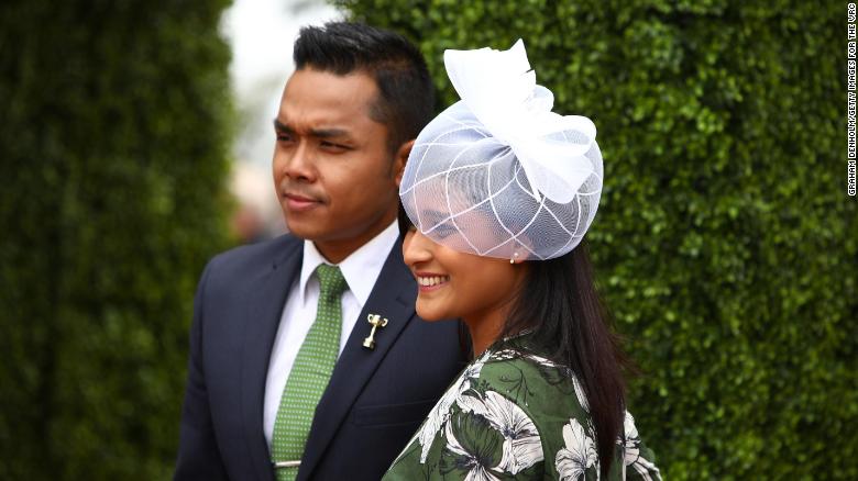 Racegoers enjoy the atmosphere on Melbourne Cup Day at Flemington Racecourse on November 7.