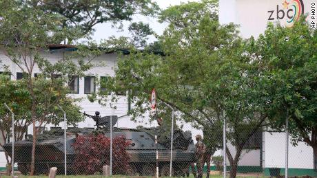 An armored military vehicle is outside the state-run Zimbabwe Broadcasting Corp. building in Harare on November 15.