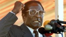 HARARE, ZIMBABWE:  Zimbabwean President Robert Mugabe addresses Zanu PF followers at a rally in the Harare suburb of Highfield, 17 June 2000. Some 5,000 people gathered to hear their President&#39;s speech a week ahead of the 24-25 June parliamentary elections. (ELECTRONIC IMAGE) AFP PHOTO ODD ANDERSEN (Photo credit should read ODD ANDERSEN/AFP/Getty Images)