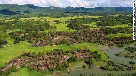 This picture taken on October 10, 2017 shows the remains of burnt villages near Maungdaw in Northern Rakhine State.
