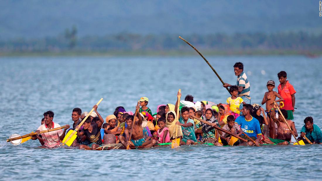 Rohingya Muslims paddle a makeshift raft as they cross the Naf River from Myanmar into Bangladesh on November 12. Human rights activists consider the Rohingya to be among the world&#39;s most persecuted people.