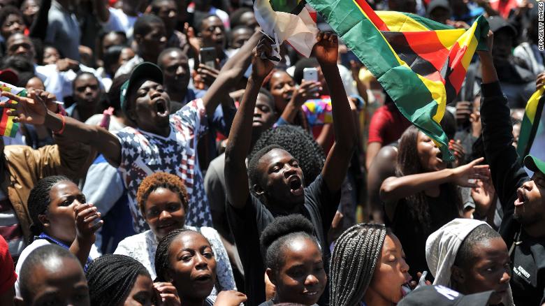 Students from the University of Zimbabwe participate in a demonstration in Harare on Monday, November 20. Tens of thousands of people have protested in the streets for the ouster of longtime President Robert Mugabe, who has &lt;a href=&quot;http://edition.cnn.com/2017/11/20/africa/zimbabwe-mugabe/index.html&quot; target=&quot;_blank&quot;&gt;refused to step down from office&lt;/a&gt; despite a military takeover of the country last week. Mugabe, 93, has led Zimbabwe for nearly four decades.