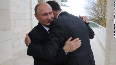 Vladimir Putin embraces Bashar al-Assad during a meeting in Sochi, Russia in November, 2017.