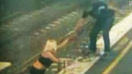 woman train track australia