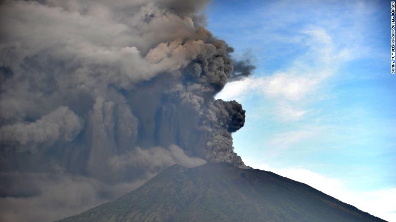Mount Agung sent smoke rising thousands of meters into the air, shutting down flights. 