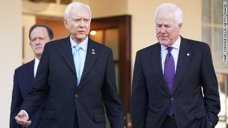 Senate Finance Committee members Sen. Pat Toomey (R-PA) (L) and Sen. John Cornyn (R-TX) (R) walk out of the West Wing with Chairman Orrin Hatch (R-UT) following a lunch meeting with U.S. President Donald Trump at the White House November 27, 2017 in Washington, DC. Senate Republicans hope to pass tax reform and tax cut legislation this week and move closer to Trump&#39;s goal of signing it before the end of the year. 