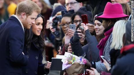 Prince Harry and fiancee Meghan Markle attend the Terrance Higgins Trust World AIDS Day charity fair in Nottingham on Friday.