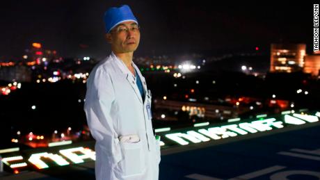 Dr. Lee Cook-Jong on the hospital's rooftop helipad.