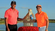 <strong>Pretty in pink:</strong> Woods made a promising comeback from 10 months out in December but Rickie Fowler received the trophy for winning the Hero World Challenge, which benefits Woods' charity.