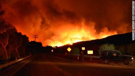 The brush fire known as the Thomas Fire pushes toward East Ventura on Monday night.