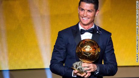 ZURICH, SWITZERLAND - JANUARY 12: Cristiano Ronaldo of Portugal and Real Madrid receives the 2014 FIFA Ballon d'Or award for the player of the year during the FIFA Ballon d'Or Gala 2014 at the Kongresshaus on January 12, 2015 in Zurich, Switzerland. (Photo by Philipp Schmidli/Getty Images)