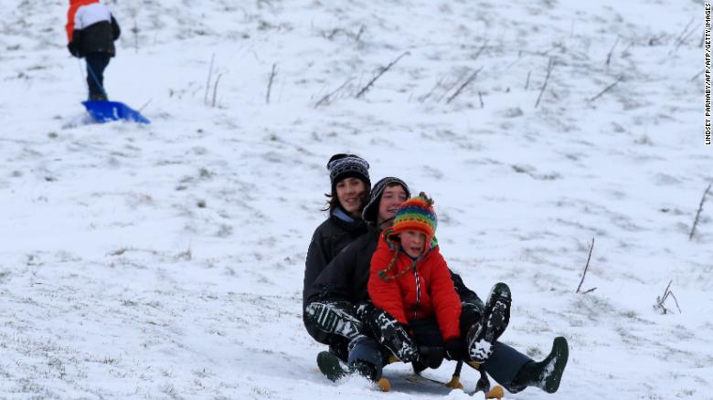 Families take to the hills with sledges near Edale in Derbyshire, northern England.
