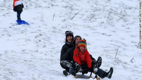 Families take to the hills with sledges near Edale in Derbyshire, northern England.