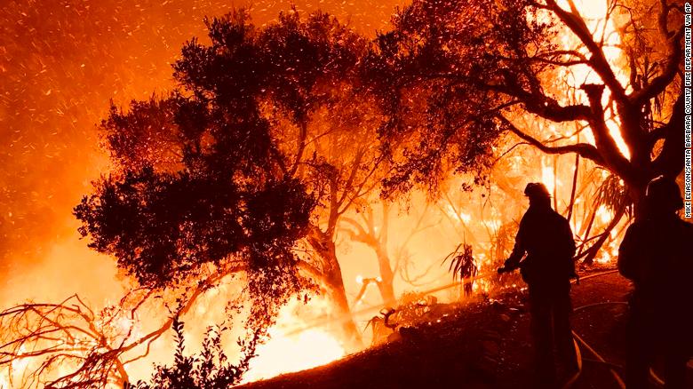 In this photo released by the Santa Barbara County Fire Department on Sunday, December 10, firefighters battle a wildfire as it advances on homes in Carpinteria, California. Powerful Santa Ana winds and extremely dry conditions are fueling &lt;a href=&quot;http://www.cnn.com/2017/12/07/us/ventura-fire-california/index.html&quot;&gt;wildfires in Southern California&lt;/a&gt; in what has been a devastating year for &lt;a href=&quot;http://www.cnn.com/interactive/2017/12/us/california-wildfires-cnnphotos/&quot;&gt;such natural disasters in the state&lt;/a&gt;.