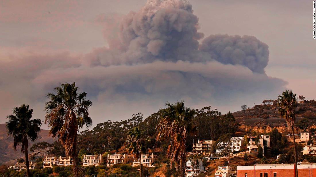 A cloud of smoke overshadows downtown Ventura, California, on December 10.