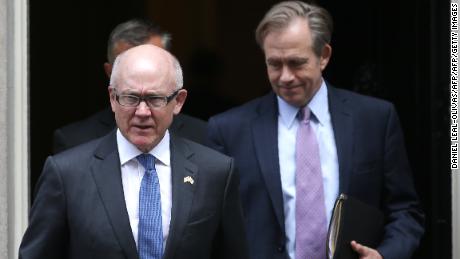 US ambassador to the UK Woody Johnson (L) leaves Downing Street after meeting Britain&#39;s Prime Minister Theresa May in central London on September 26.