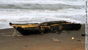 The wooden boat washed ashore at a beach on December 12, 2017 in Kashiwazaki, Niigata, Japan. 