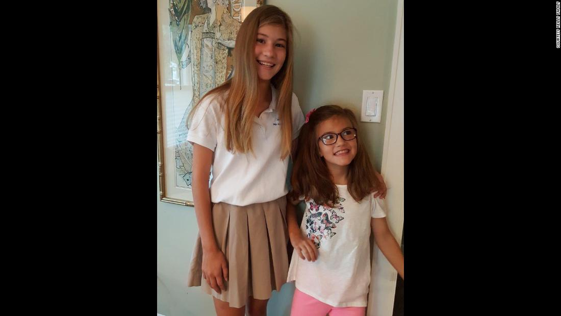 Avery and her sister Presley took a first-day-of-school photo in August 2016. Presley helped Avery stand up by leaning her against the wall.  &quot;Avery loves school and was so excited to be heading back to school after her August break,&quot; her father said.