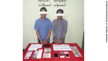 An altered image released by Myanmar&#39;s Ministry of Information shows two Reuters journalists, Wa Lone and Kyaw Soe Oo, in handcuffs.