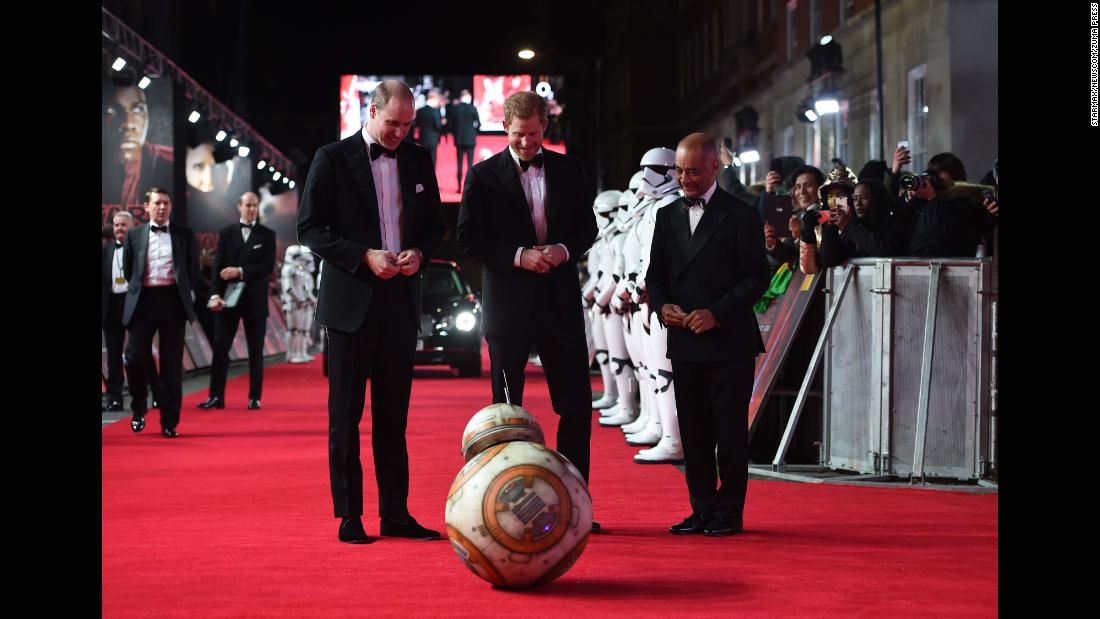 Britain&#39;s Prince William, left, stands next to his brother, Prince Harry, as they watch a BB-8 droid bow to them at the London premiere of &quot;Star Wars: The Last Jedi&quot; on Tuesday, December 12.