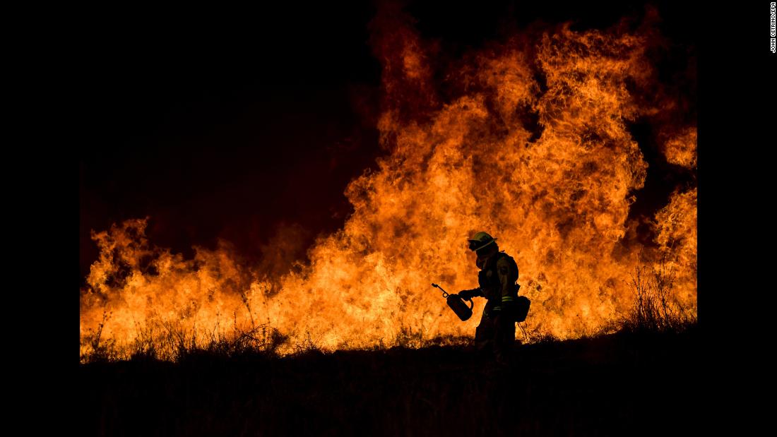 A firefighter works in Ojai, California, where the Thomas wildfire continued to rage on Saturday, December 9. The Thomas Fire, &lt;a href=&quot;http://www.cnn.com/2017/12/14/us/california-fires/index.html&quot; target=&quot;_blank&quot;&gt;one of six major wildfires burning in Southern California,&lt;/a&gt; is already the fourth-largest in state history, according to CalFire.