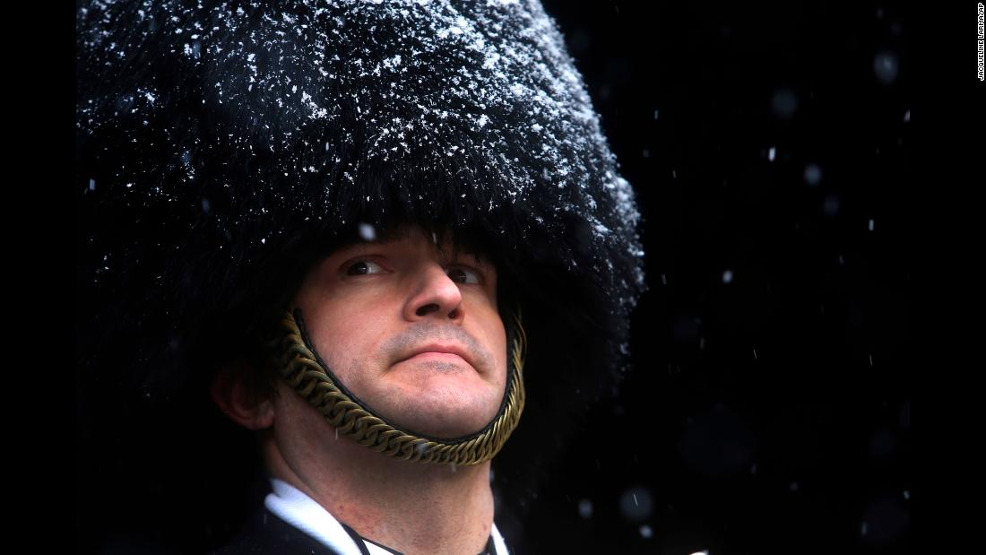 James Hurd, drum major of the Naval Academy Band, waits to lead the band onto a snowy field in Philadelphia before the annual Army-Navy football game on Saturday, December 9. 
