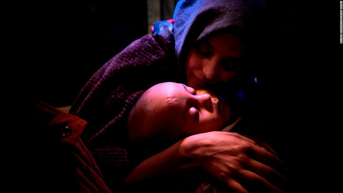 A woman holds her child as she and other migrants are transferred to a temporary shelter in Bamako, Mali, on Wednesday, December 13. They were being repatriated from Libya. In recent years, Libya has been flooded by migrants hoping to travel to Europe. The United Nations estimates there are now between 700,000 and 1 million migrants in the country. Those who have crossed the Mediterranean Sea have shared stories about beatings, kidnappings and enslavement. Libyan officials&lt;a href=&quot;http://www.cnn.com/2017/11/23/africa/libya-reaction-slave-trade/index.html&quot; target=&quot;_blank&quot;&gt; have denounced the migrant slave auctions &lt;/a&gt;exposed in &lt;a href=&quot;http://www.cnn.com/2017/11/14/africa/libya-migrant-auctions/index.html&quot; target=&quot;_blank&quot;&gt;a recent CNN investigation,&lt;/a&gt; but they claim more support is required from the global community to tackle the issue.