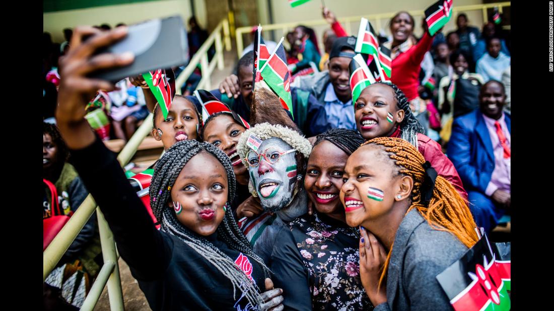 People take a selfie together during Independence Day celebrations in Nairobi, Kenya, on Tuesday, December 12.