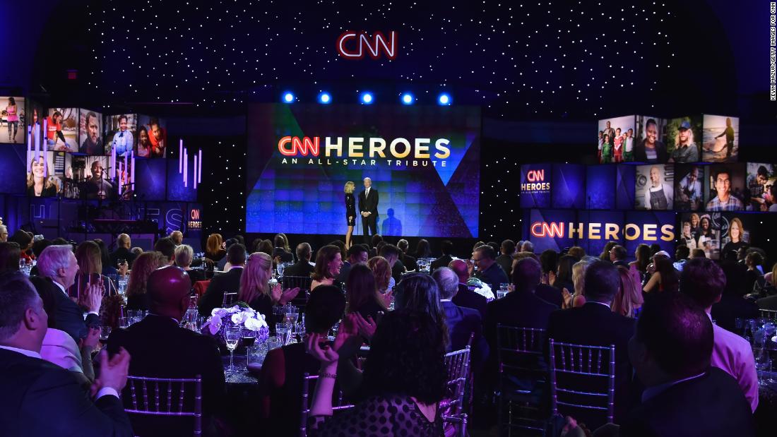 Co-hosts Kelly Ripa and Anderson Cooper speak onstage during 2017&#39;s CNN Heroes tribute gala, held on December 17 at the American Museum of Natural History in New York City.