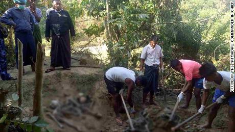 Authorities in Rakhine state work to uncover a mass grave found in a village north of the provincial capital Sittwe.
