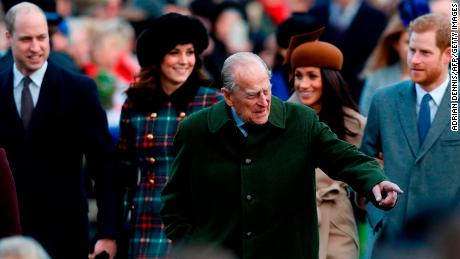 Britain's Prince Philip, Duke of Edinburgh gestures to the crowd.