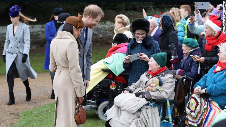 Meghan Markle and Prince Harry meet well-wishers outside the church.
