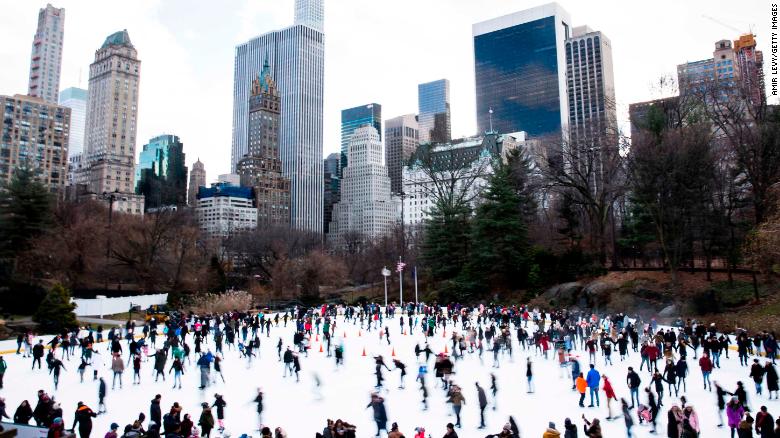 People skate at the ice rink at Central Park on Christmas day in New York City.
