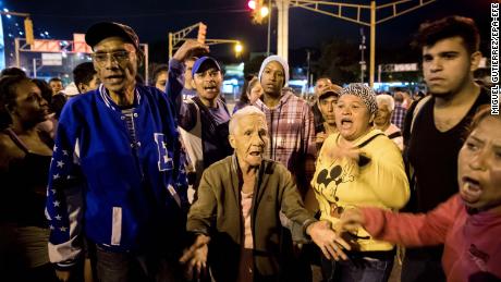 Protesters take to the streets of Caracas, Venezuela, on Wednesday night.  The country has witnessed angry demonstrations over shortages of basic supplies including gas, food and water. 