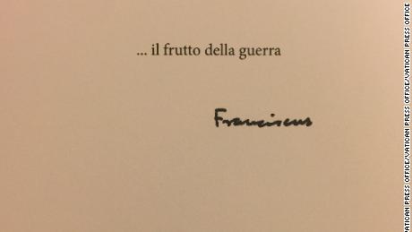 The Pope&#39;s signature is above a description of the image.